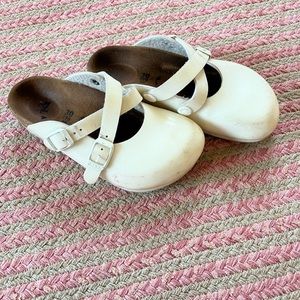 Pearl white Birkenstock clogs. Size 30. US 12-12.5. Good condition.
